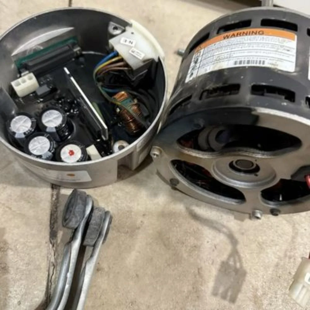 replacing failed furnace motor, image of new and burnt motor
